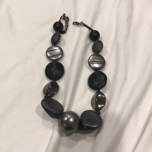 Black and silver wooden bead necklace.
